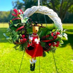 Precious “Lady Deer” on white grapevine wreath.